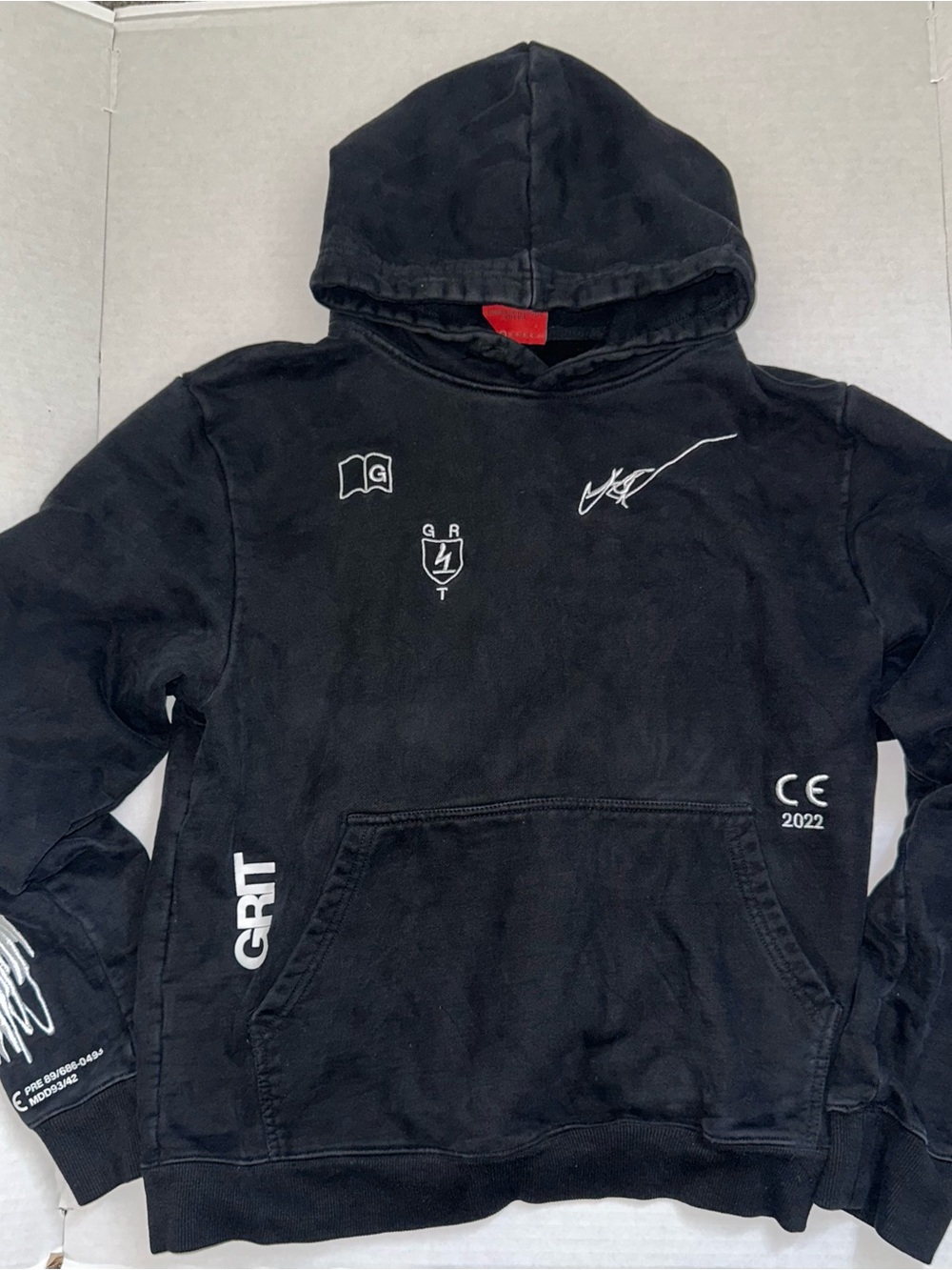 True Grit Black Pullover Hoodie with White Graphics